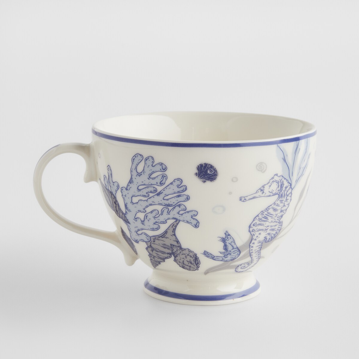Kubek Coraleia z motywem morskim