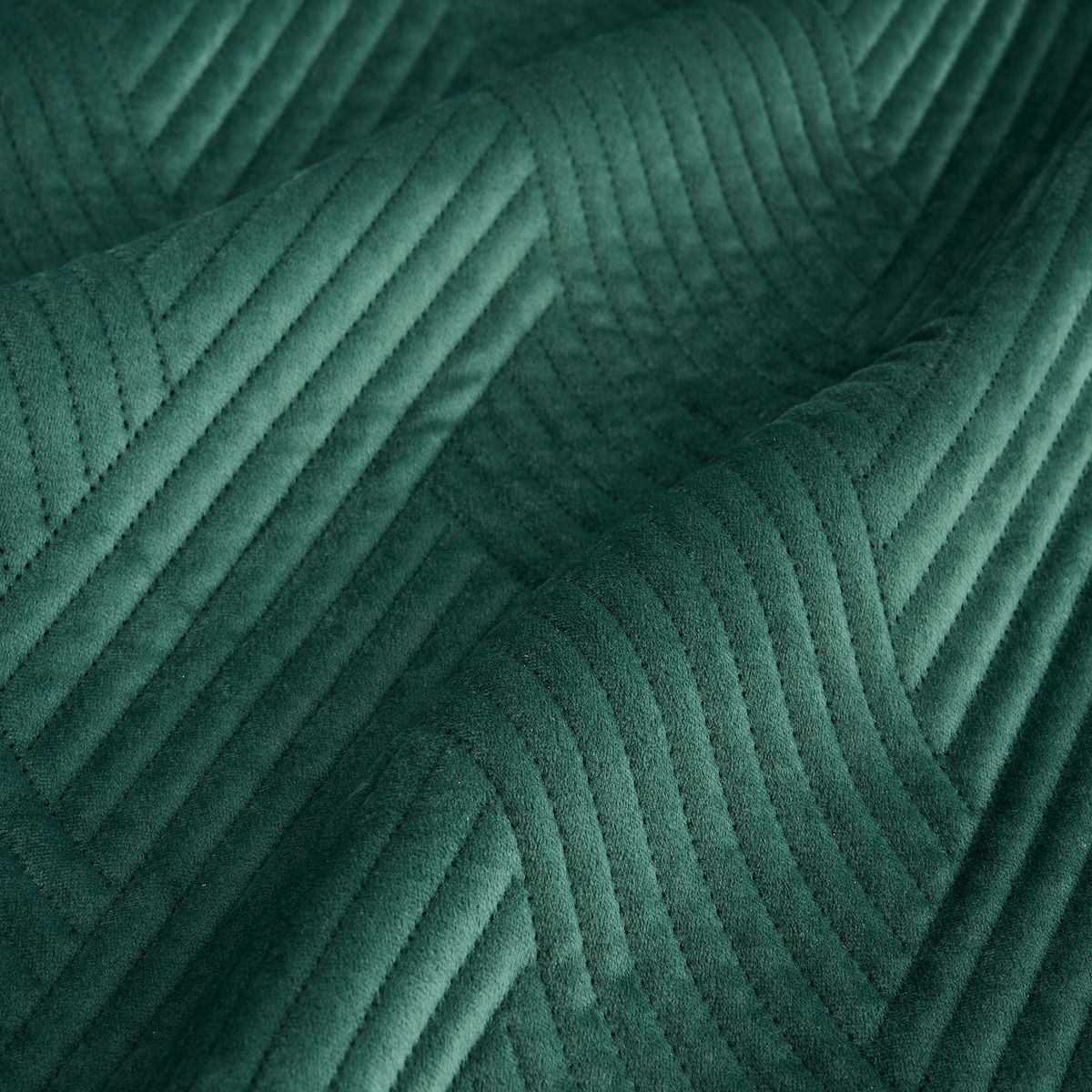 Jednokolorowa narzuta na łóżko z wytłoczonym wzorem Trialett 180x220 cm z motywem geometrycznym