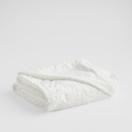 Jednokolorowy koc z wytłoczonym wzorem Conosinos 150x200 cm z motywem arabeski