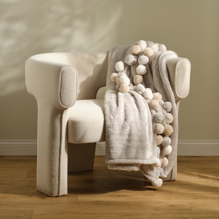 Jednokolorowy koc z pomponami Ponnie 150x200 cm