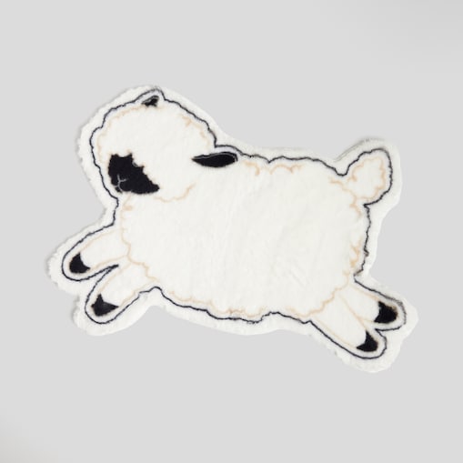 Dywanik Sheepo 88x61 cm z motywem baranka