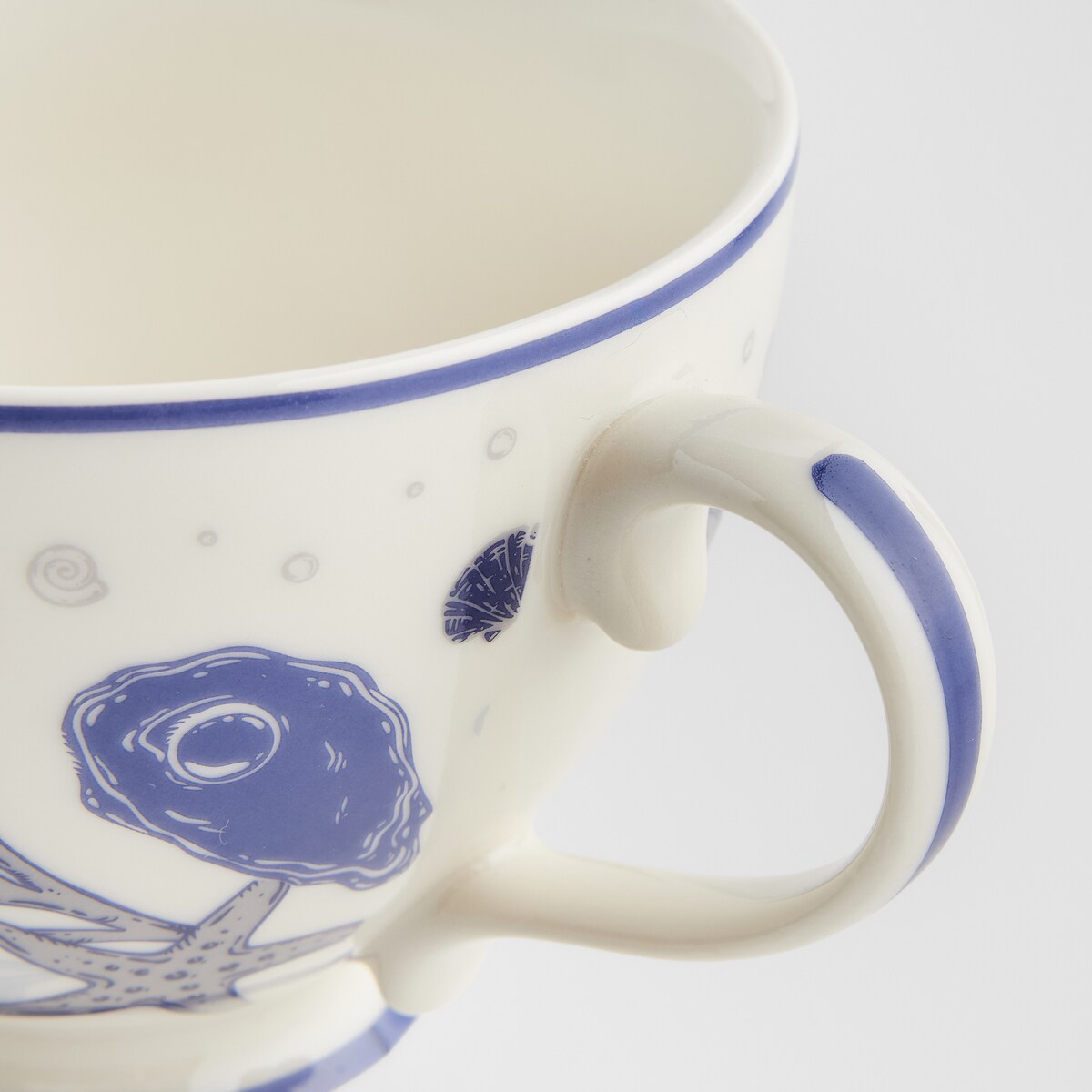 Kubek Coraleia z motywem morskim