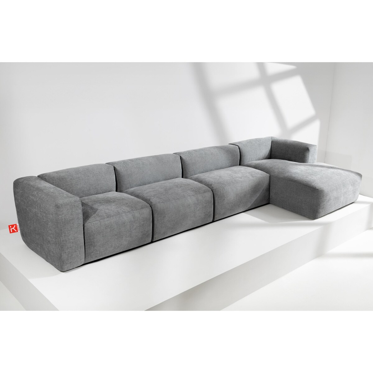 KONSIMO BUFFO Sofa narożna prawa 6-osobowa z wyjątkowo miękkim siedziskiem, kolor popielaty