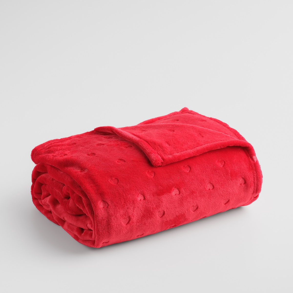 Jednokolorowy koc z wytłoczonym wzorem Kisalis 150x200 cm z motywem serca