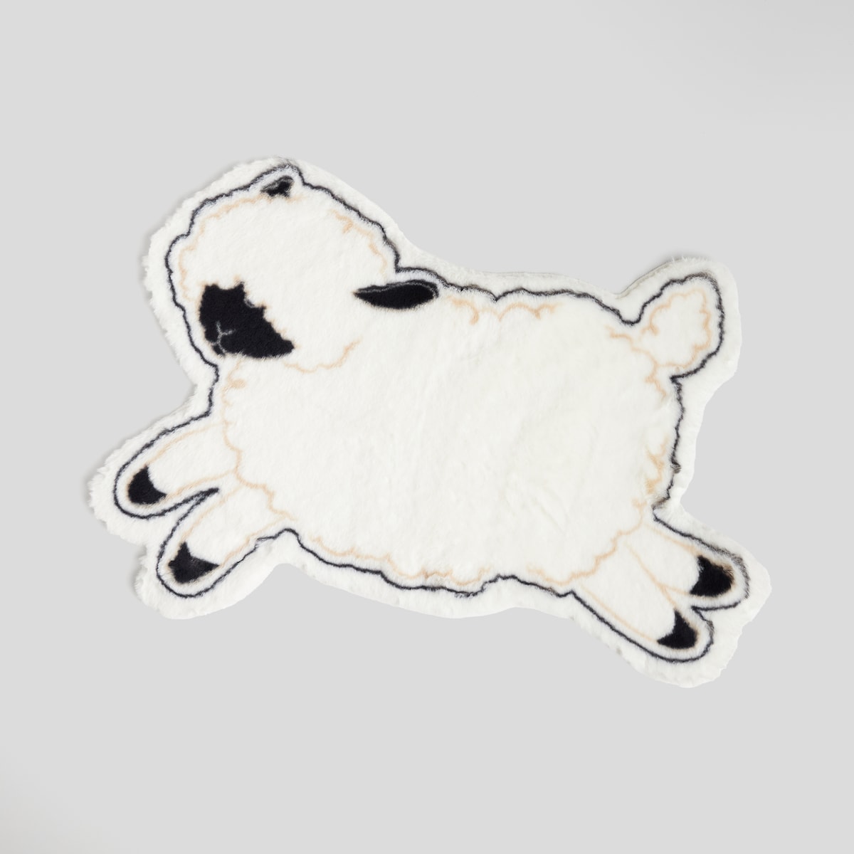 Dywanik Sheepo 88x61 cm z motywem baranka