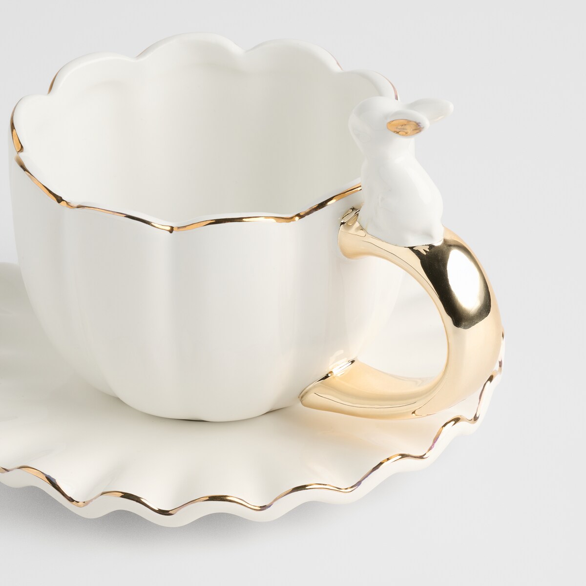 Filiżanka Ze Spodkiem Wonderland z motywem królika