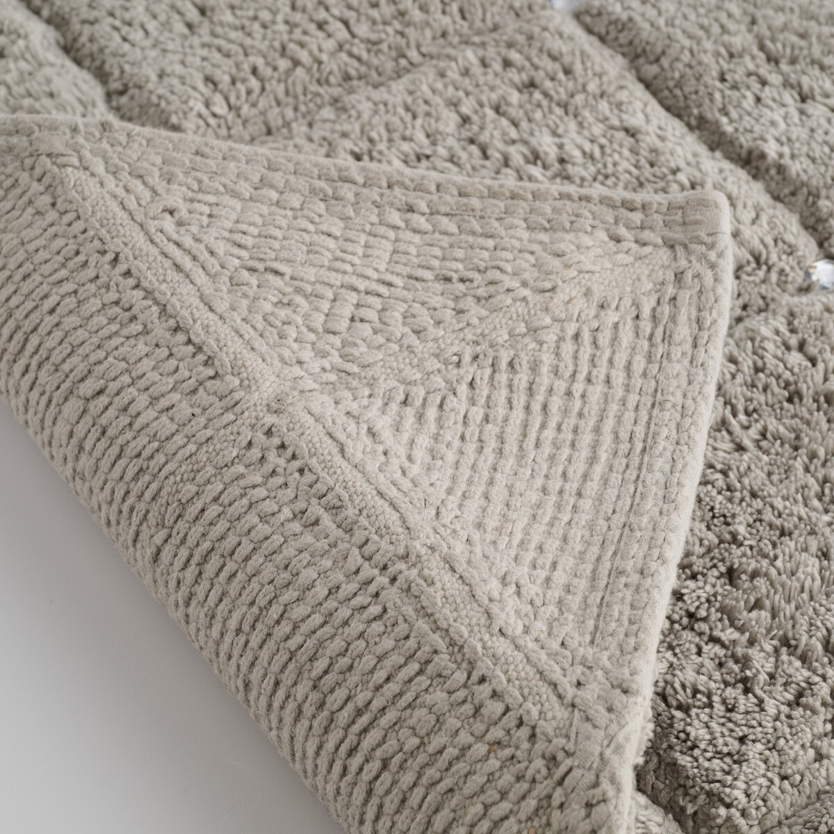 Dywanik łazienkowy Dorita 60x90 cm z motywem geometrycznym