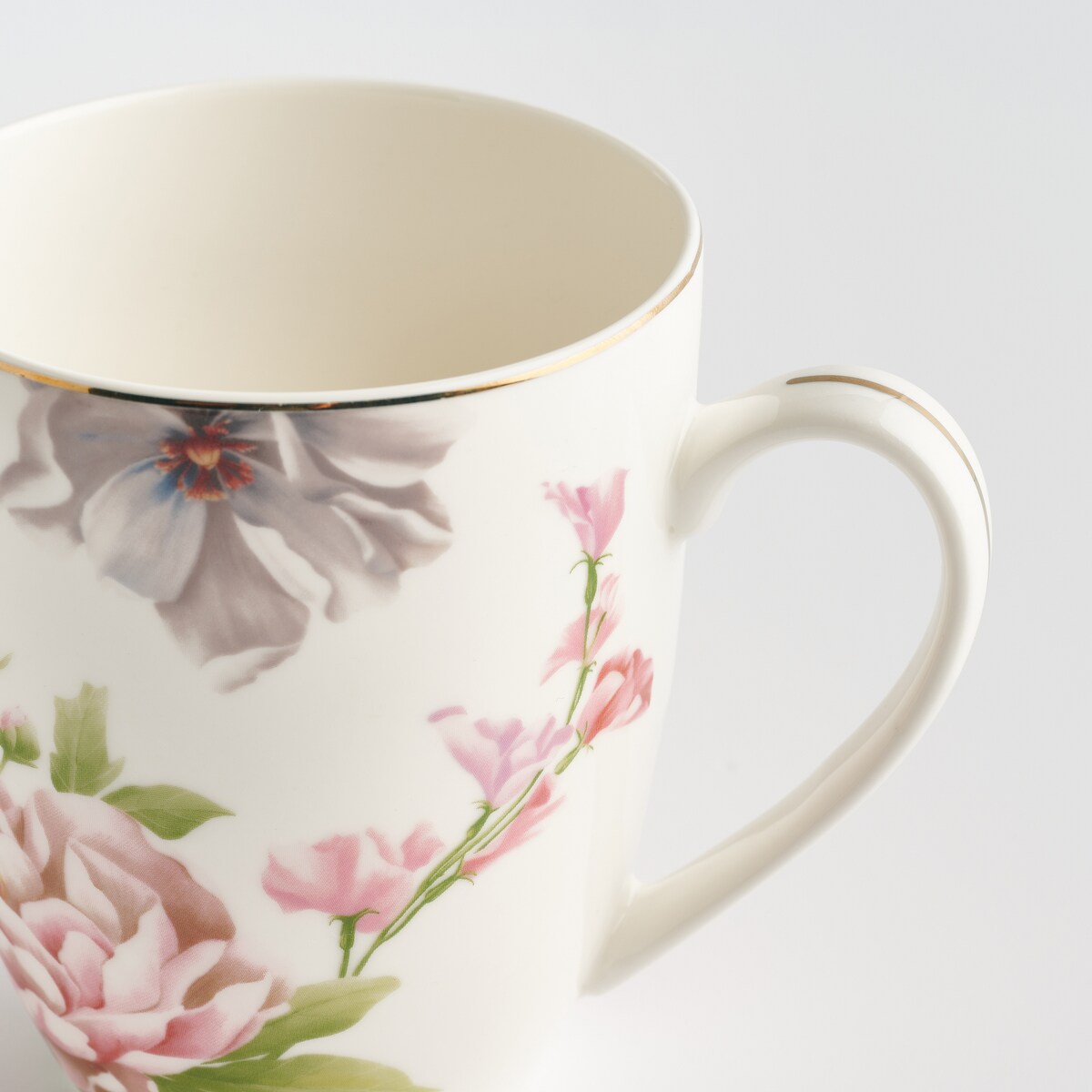 Kubek Aurelis z motywem kwiatowym