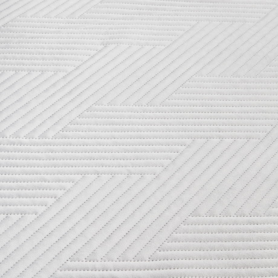 Jednokolorowa narzuta na łóżko z wytłoczonym wzorem Trialett 200x220 cm z wzorem geometrycznym