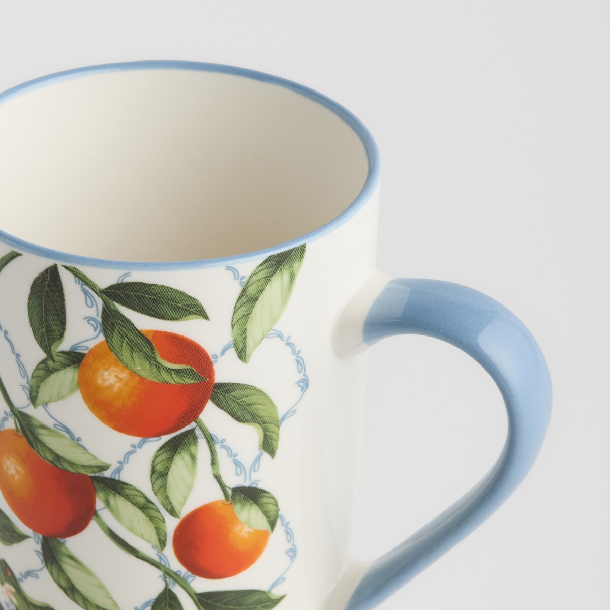 Kubek Orangio z motywem owoców