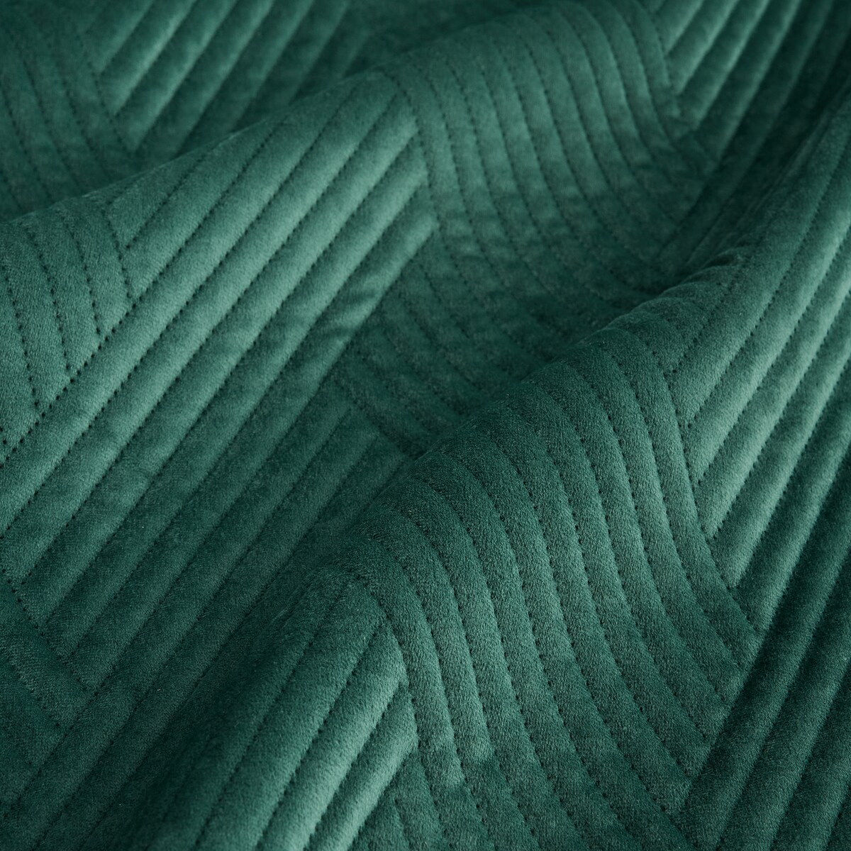 Jednokolorowa narzuta na łóżko z wytłoczonym wzorem Trialett 180x220 cm z motywem geometrycznym