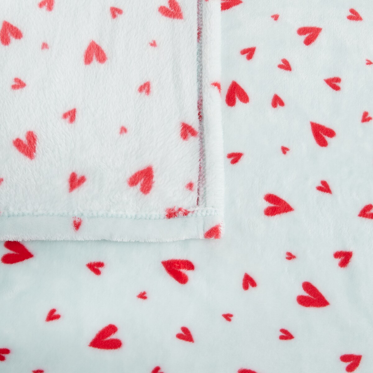 Drukowany koc Malorina 150x200 cm z motywem serc