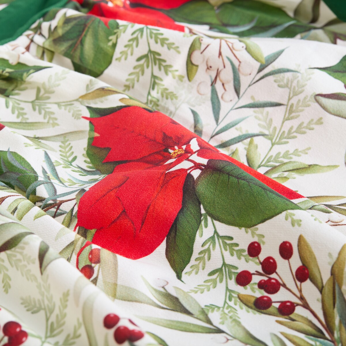 Fartuch Poinsetta 142x90 cm z motywem gwiazdy betlejemskiej