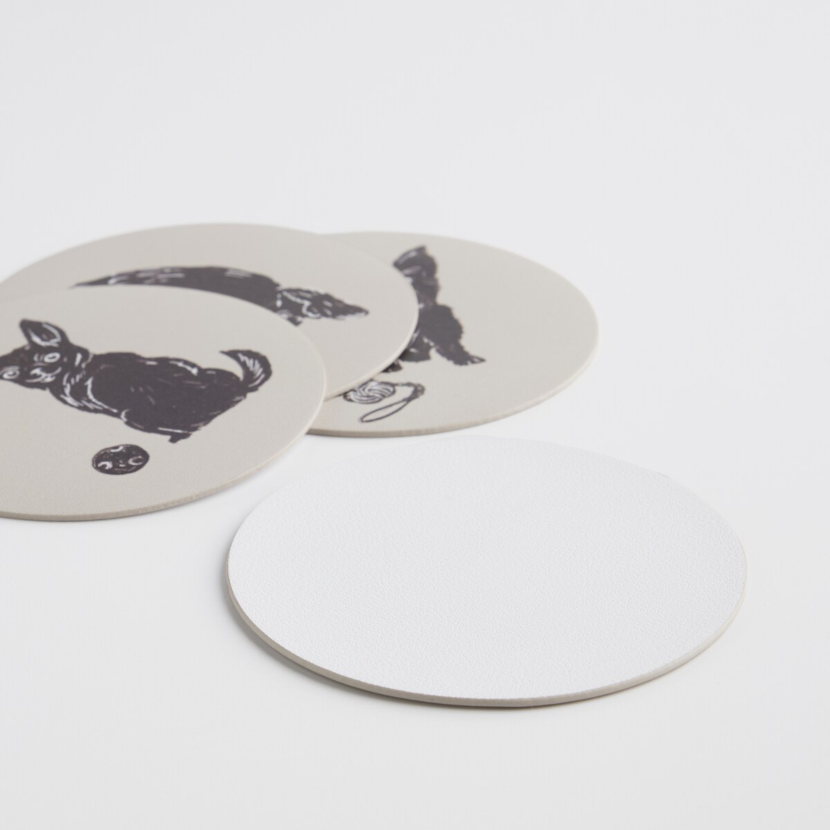 Komplet 4 podkładek pod kubek z psem Fafik