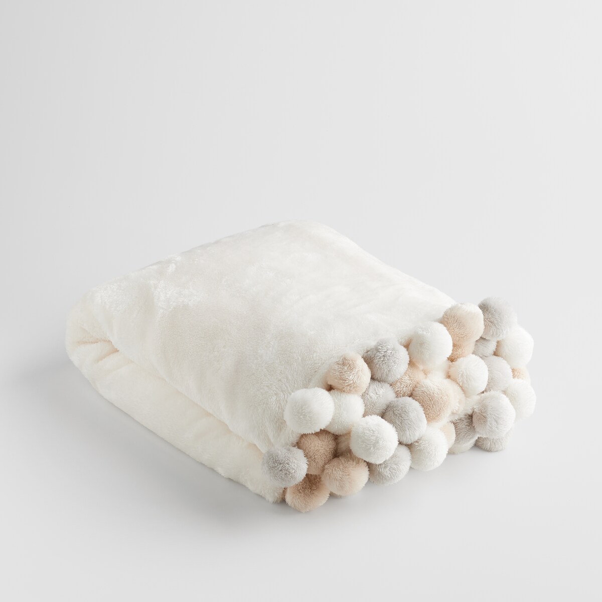Jednokolorowy koc z pomponami Ponnie 150x200 cm