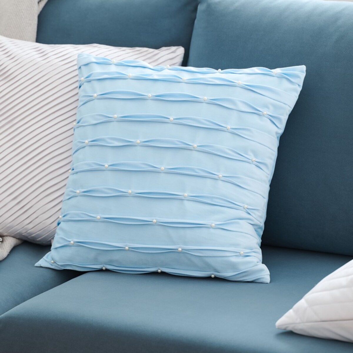 Poszewka Perline 45x45 cm z motywem perły