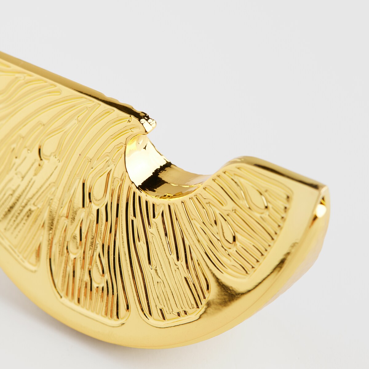 Otwieracz Sitroni z motywem roślinnym