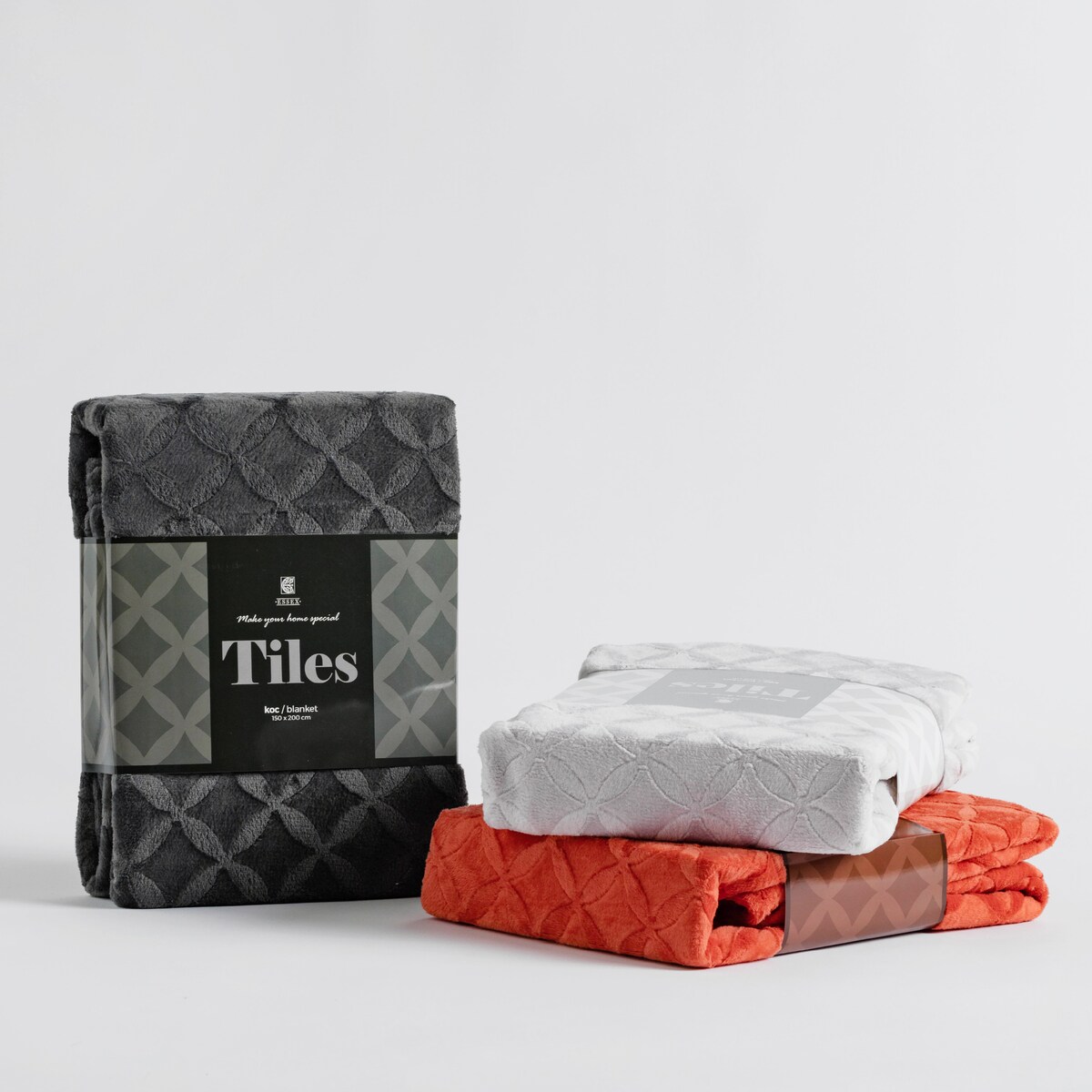 Jednokolorowy koc z wytłoczonym wzorem Tiles 150x200 cm