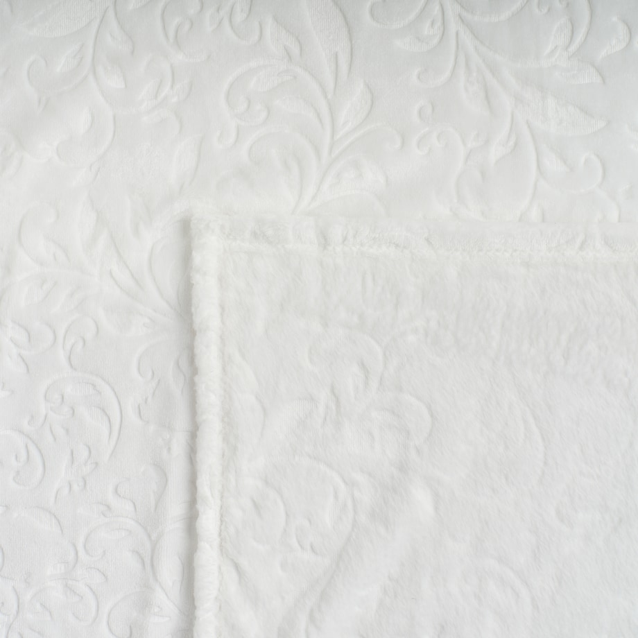 Jednokolorowy koc z wytłoczonym wzorem Conosinos 150x200 cm z motywem arabeski