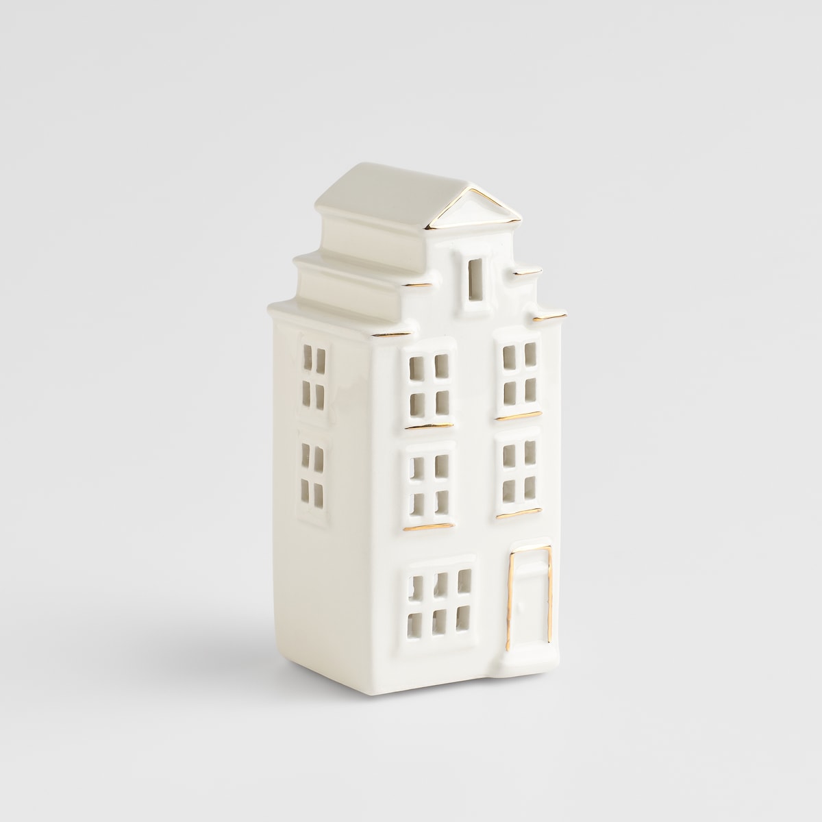 Świecznik Karit z motywem domku