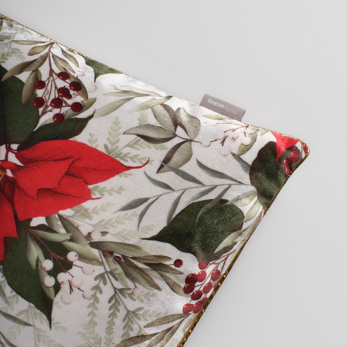 Poszewka z nadrukiem Poinsetta 45x45 cm z motywem gwiazdy betlejemskiej