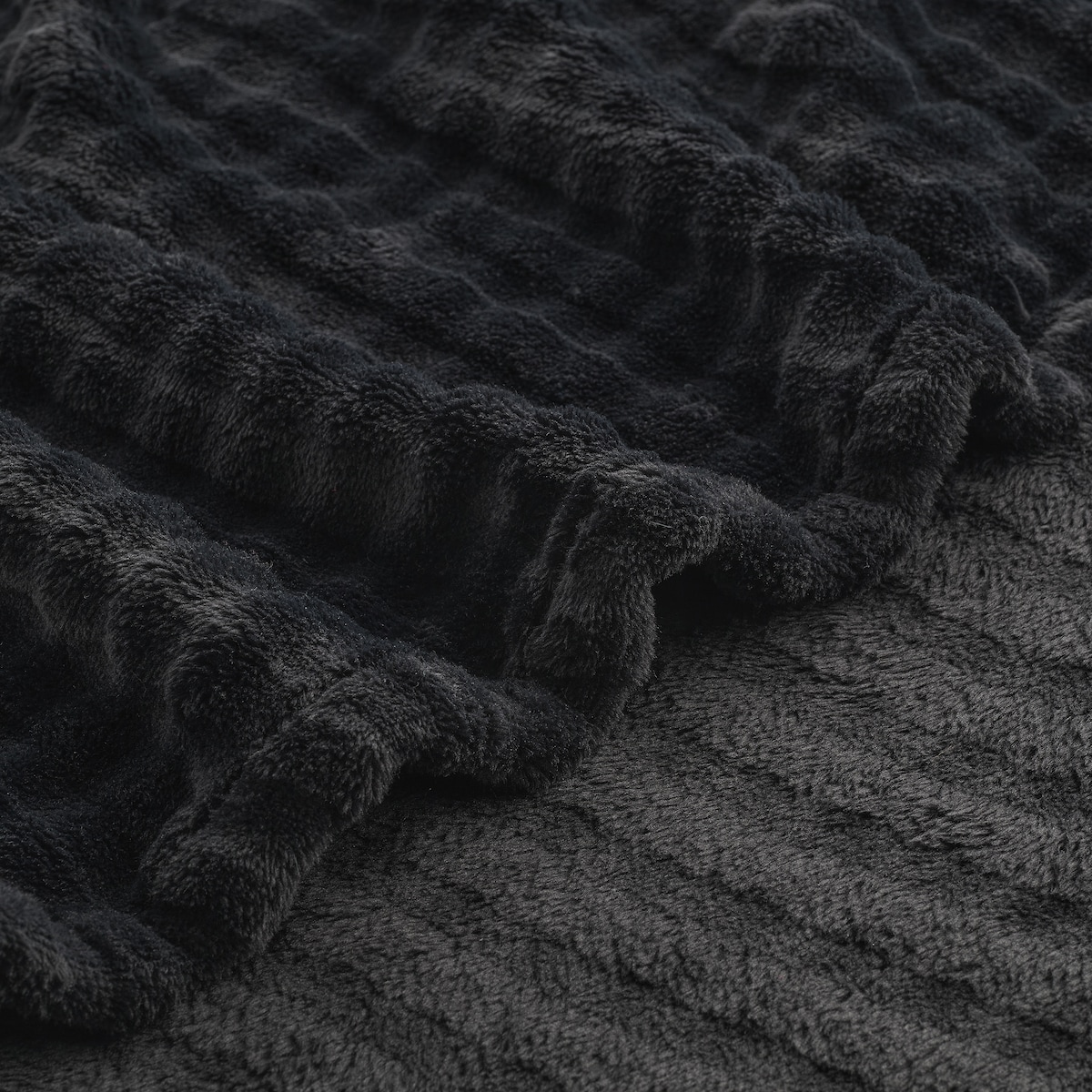 Jednokolorowy koc z wytłoczonym wzorem Operta 150x200 cm