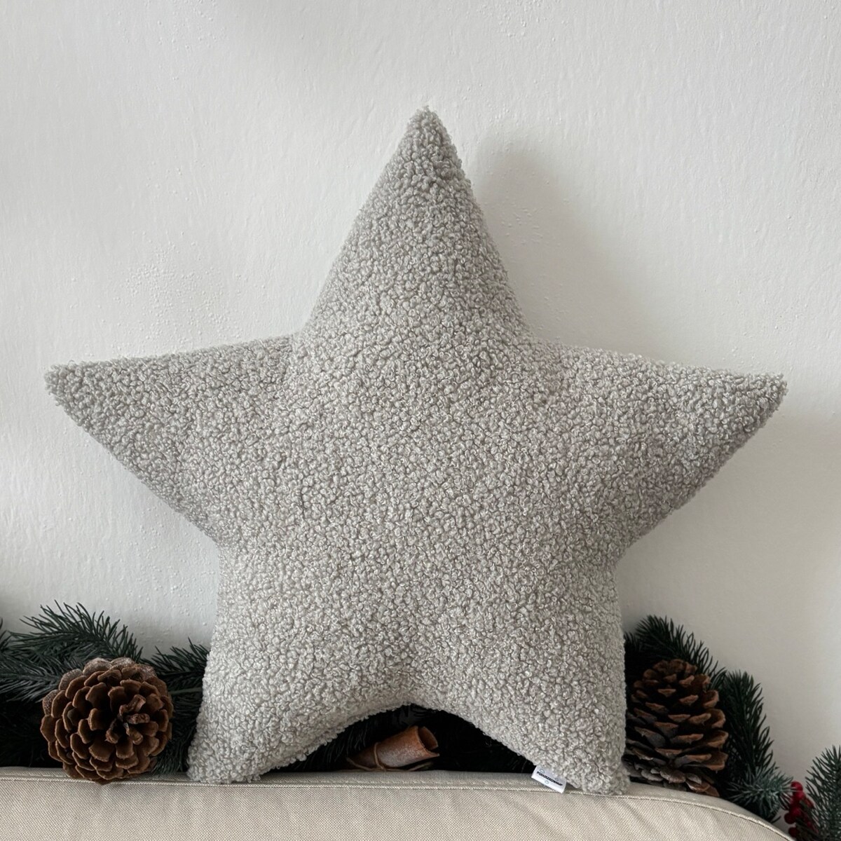 Poduszka Gwiazda boucle jasna szara