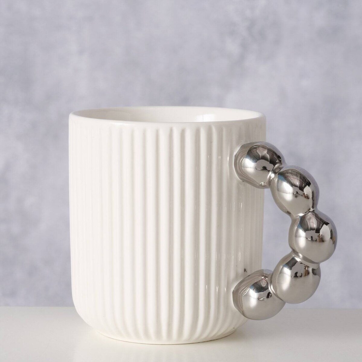 Kubek z ozdobnym uchem BOLLER