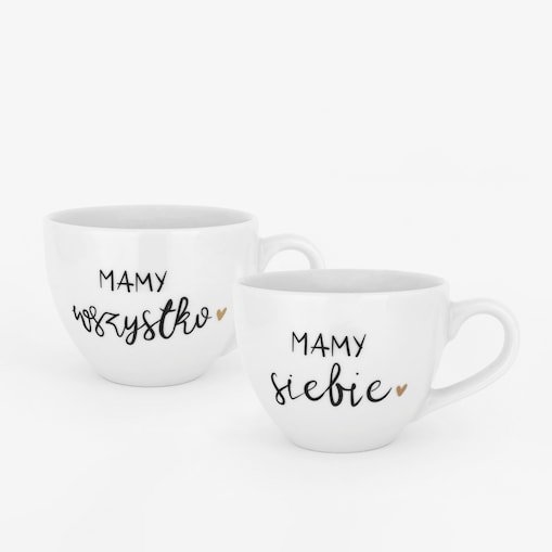 Zestaw 2 białych kubków porcelanowych 500 ml - motyw złotego serca z napisem Mamy wszystko, Mamy siebie dla par na walentynki