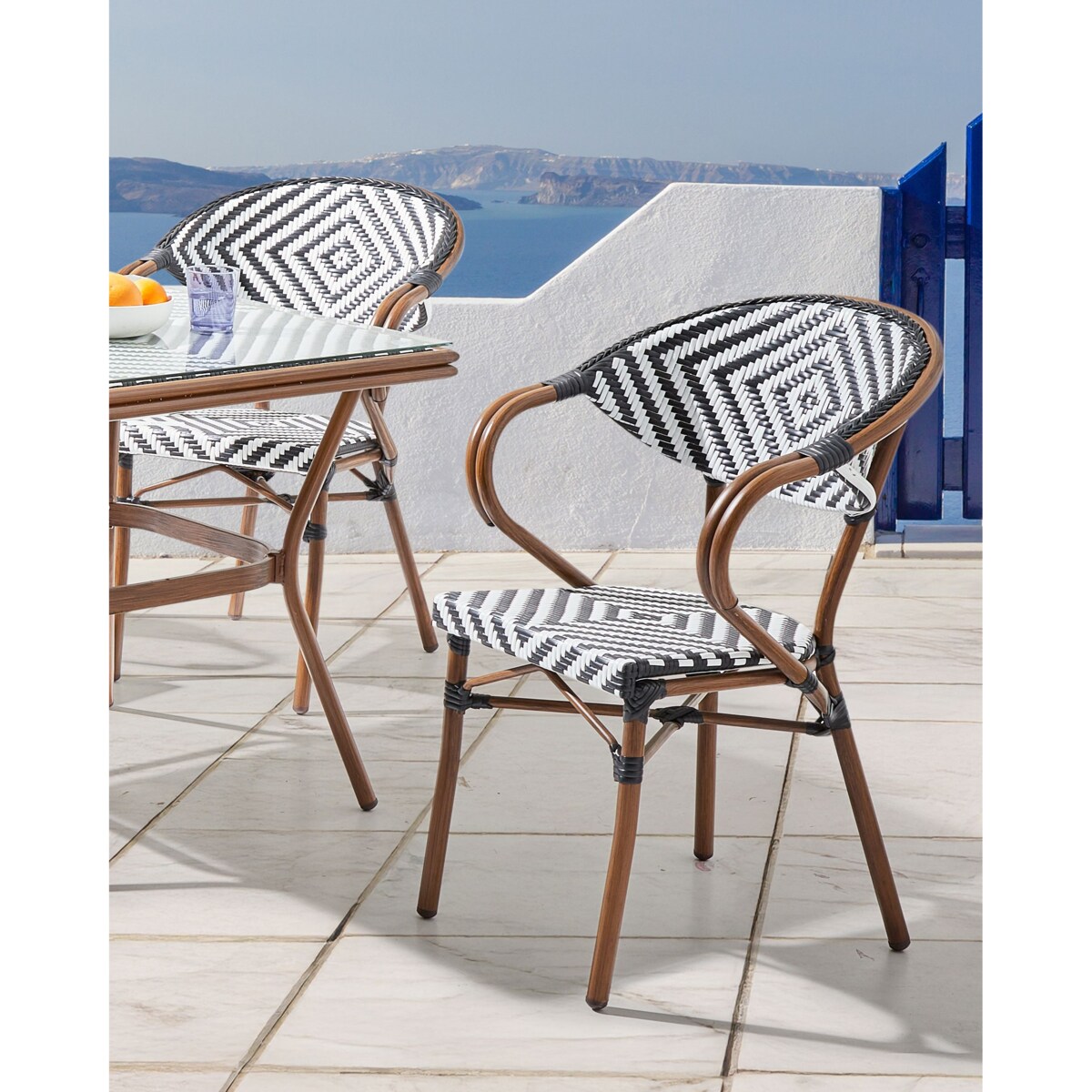 Zestaw 4 krzeseł ogrodowych RIFREDDO Technorattan Czarny/ biały