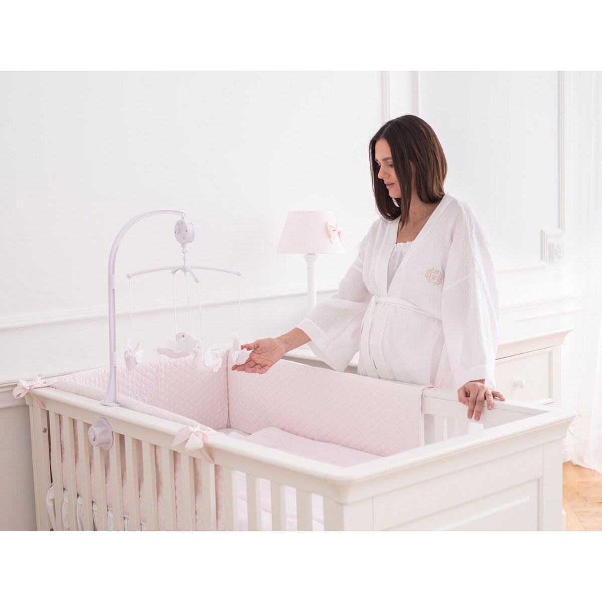 Karuzelka z pudrowymi ptaszkami