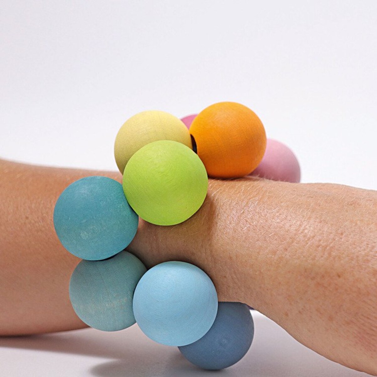 Perełki do chwytania dla niemowlaka drewniane pastelowe 0+ Grimm's