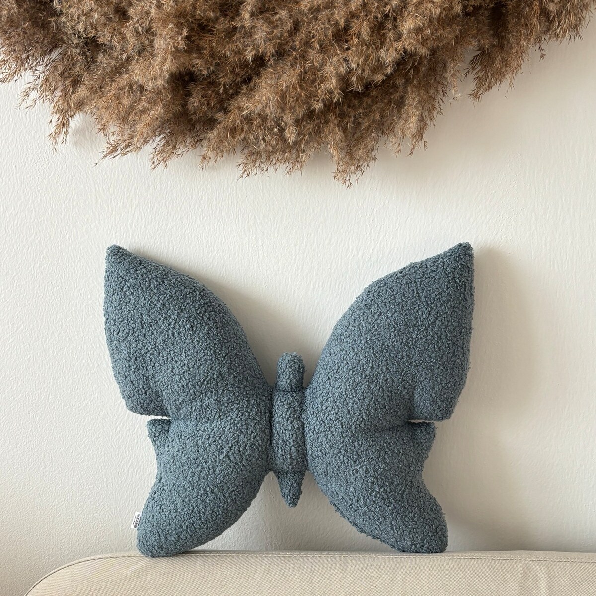 Poduszka dekoracyjna Motyl niebieski boucle