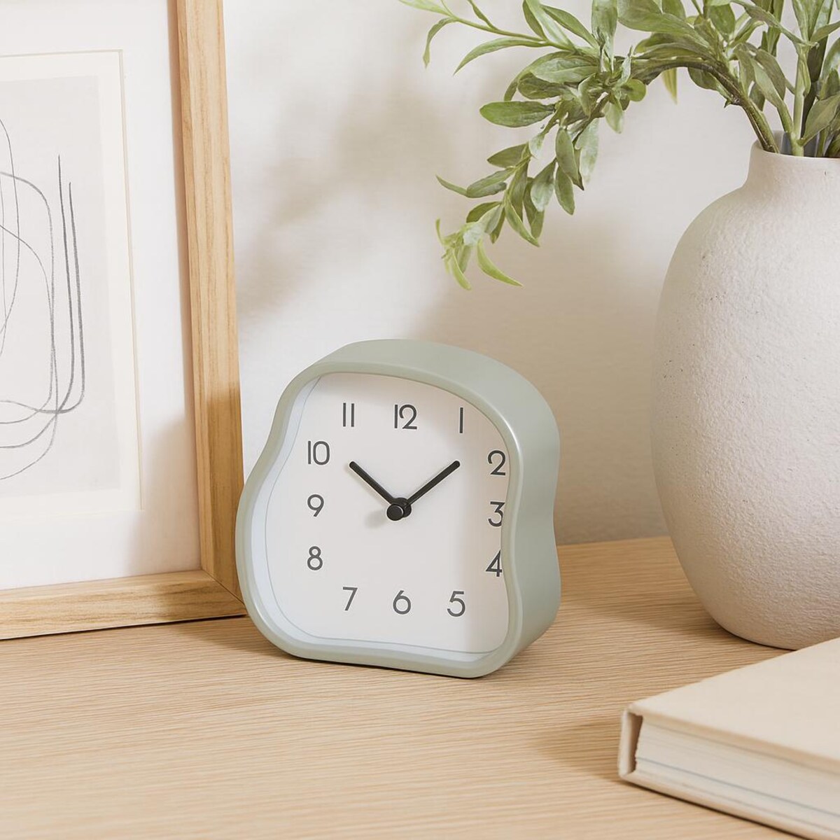 Zegar stołowy AMORPH o organicznym kształcie z przeszklonym frontem, 12 cm