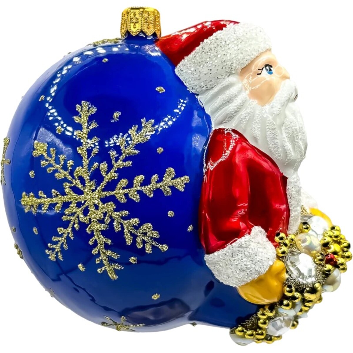 Bombka choinkowa: Święty Mikołaj na niebieskiej bombce z zimowymi zdobieniami