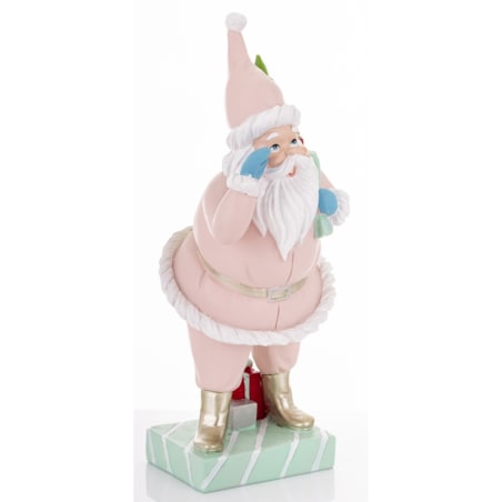 Święty Mikołaj w różowym ubraniu i z niebieskim workiem 40x17x17 cm