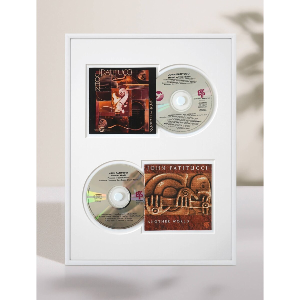 Ramka na 2 płyty CD w kolorze białym. Ramka aluminiowa o rozmiarze 30x40 cm LUCA®