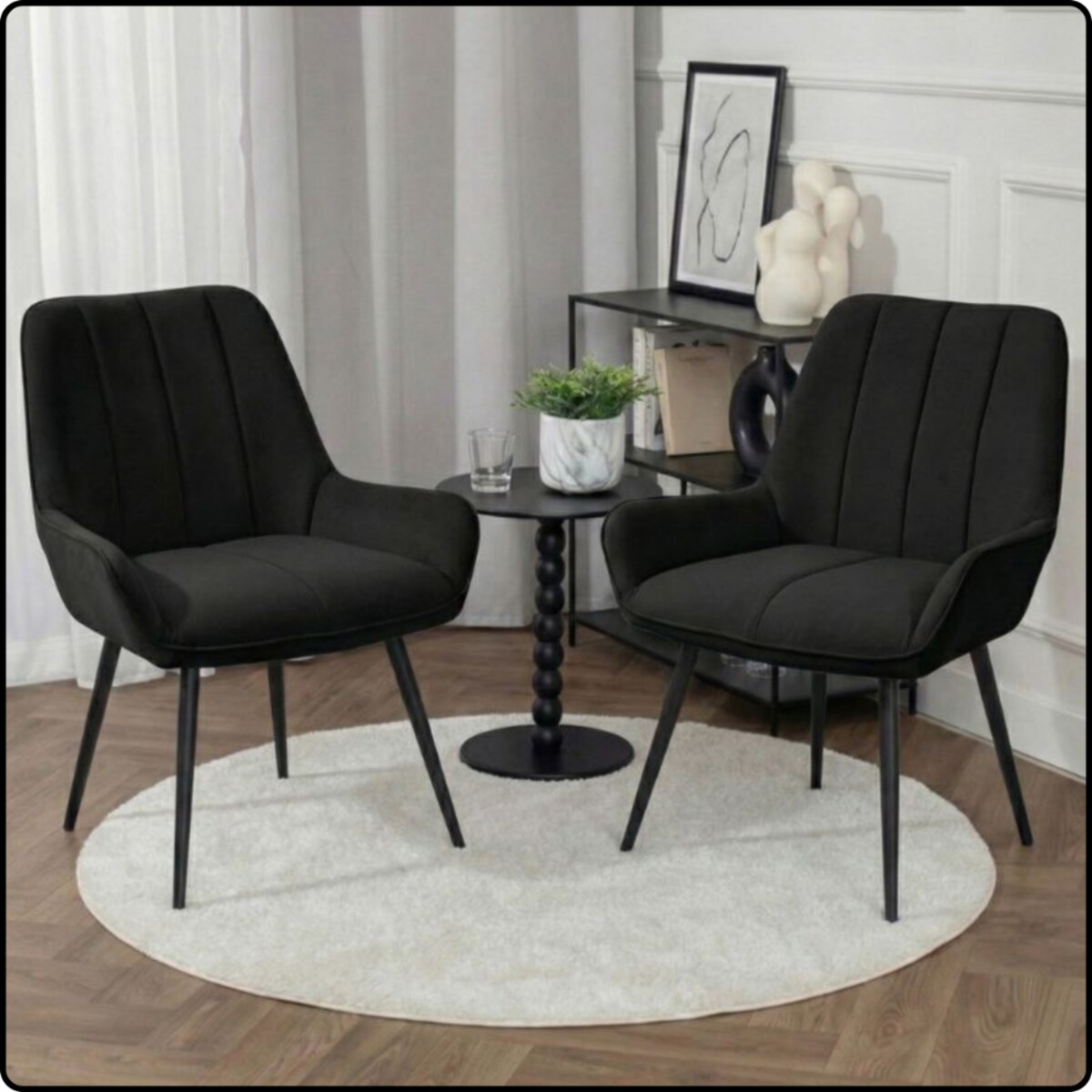 Fotel uszak tapicerowany welurowy wygodny z czarnymi nogami do salonu czarny