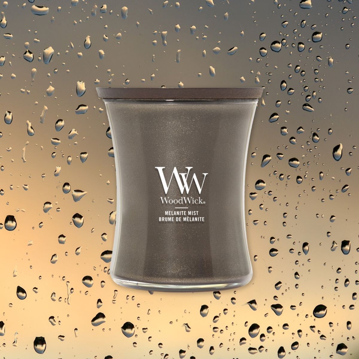 WoodWick świeca średnia MELANITE MIST