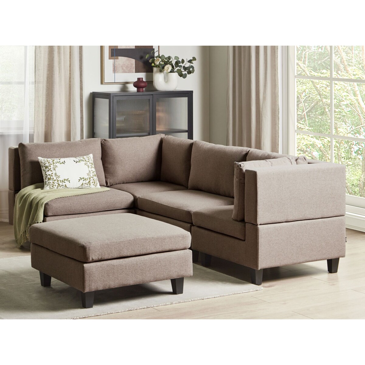 Tapicerowany prawostronny narożnik modułowy 4-osobowy z otomaną brązowy UNSTAD