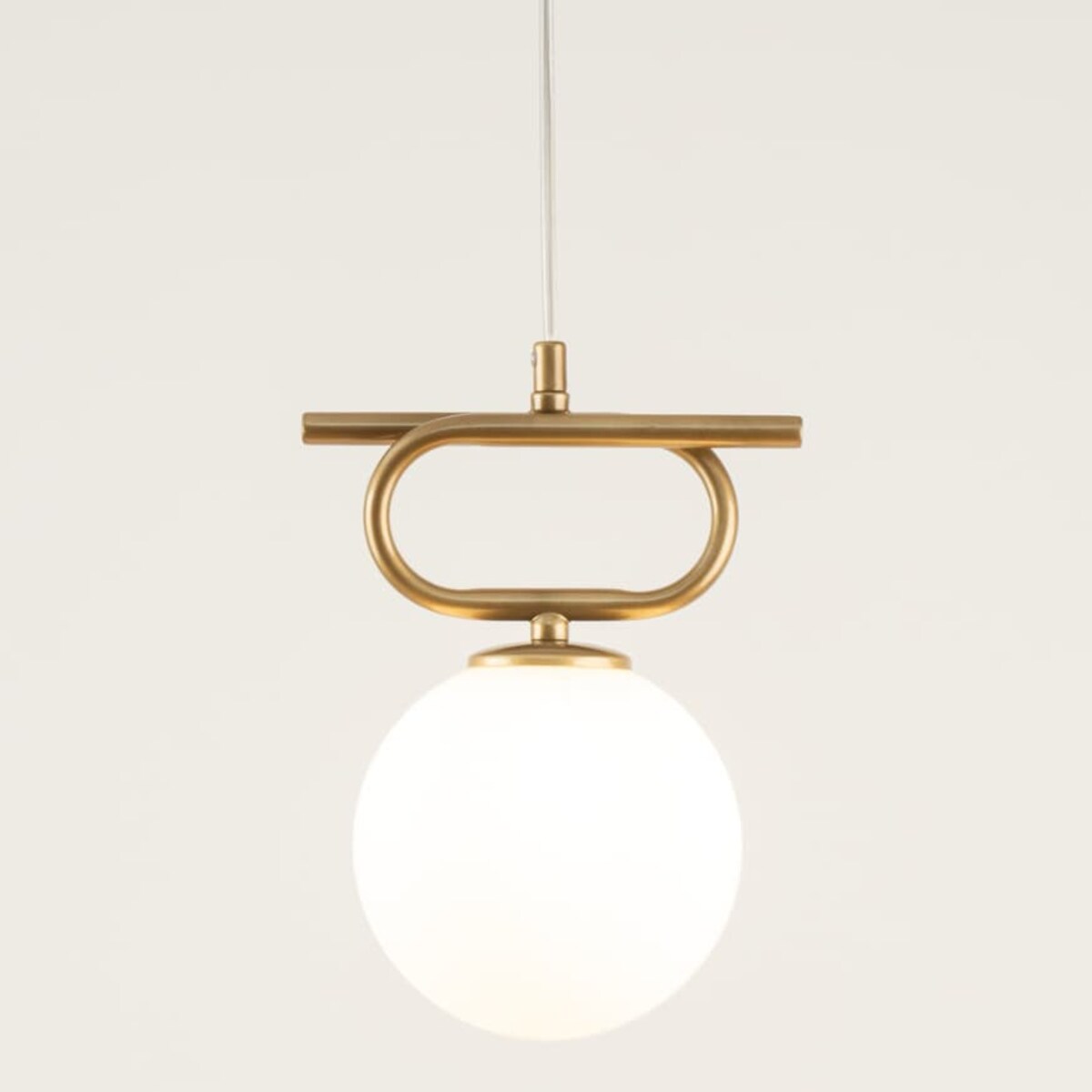 Lampa zwisowa do salonu kula Tes 33631 Sigma glamour mleczny klosz złota