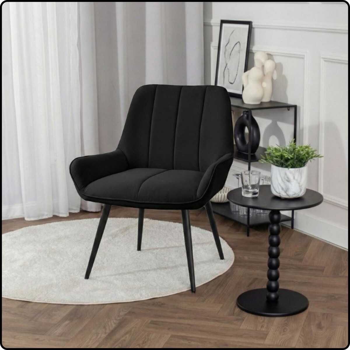 Fotel uszak tapicerowany welurowy wygodny z czarnymi nogami do salonu czarny