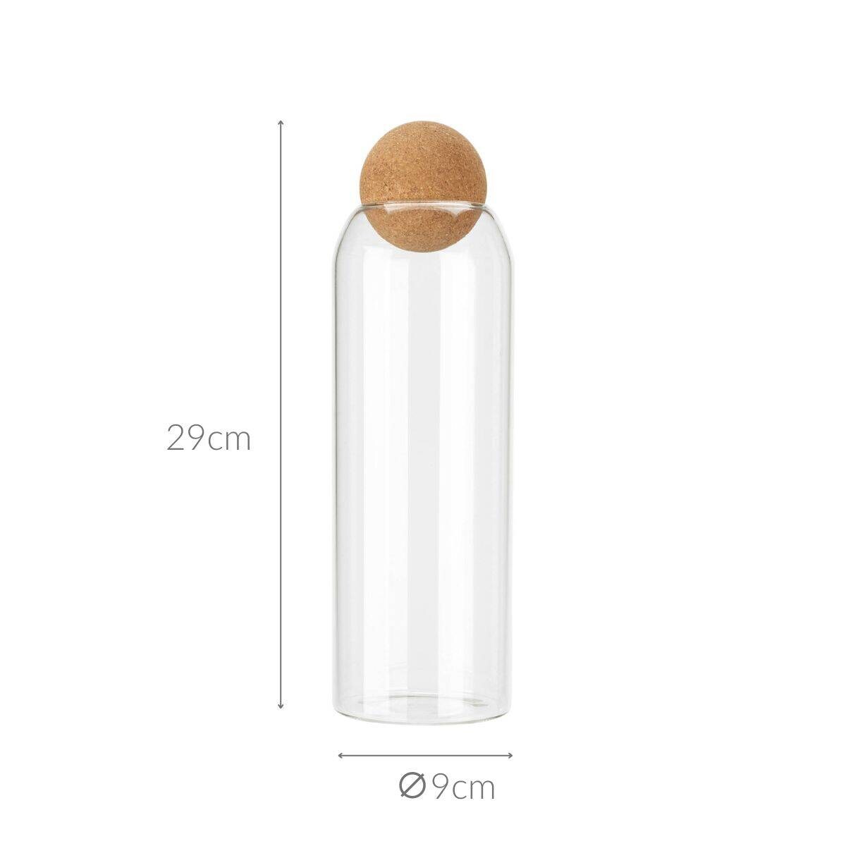 Szklany pojemnik z dekoracyjnym korkiem