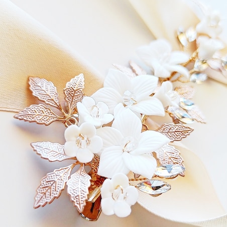 Efektowna złota spinka do włosów z kwiatami i cyrkoniami