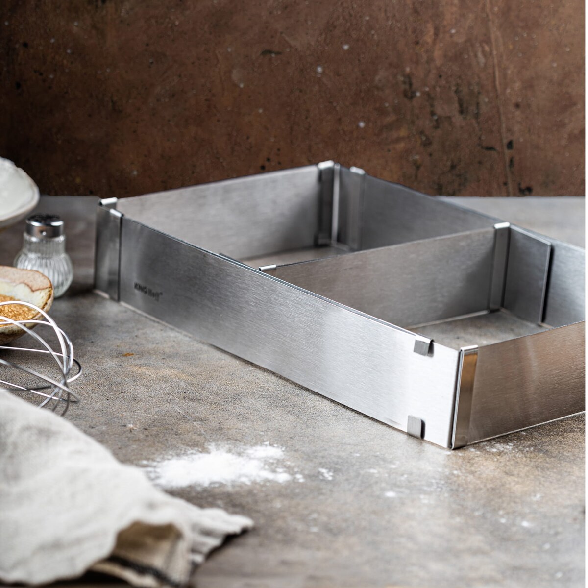 Regulowana forma do ciasta 34-52x27-18,5x5cm Tortownica Rant cukierniczy KINGHOFF