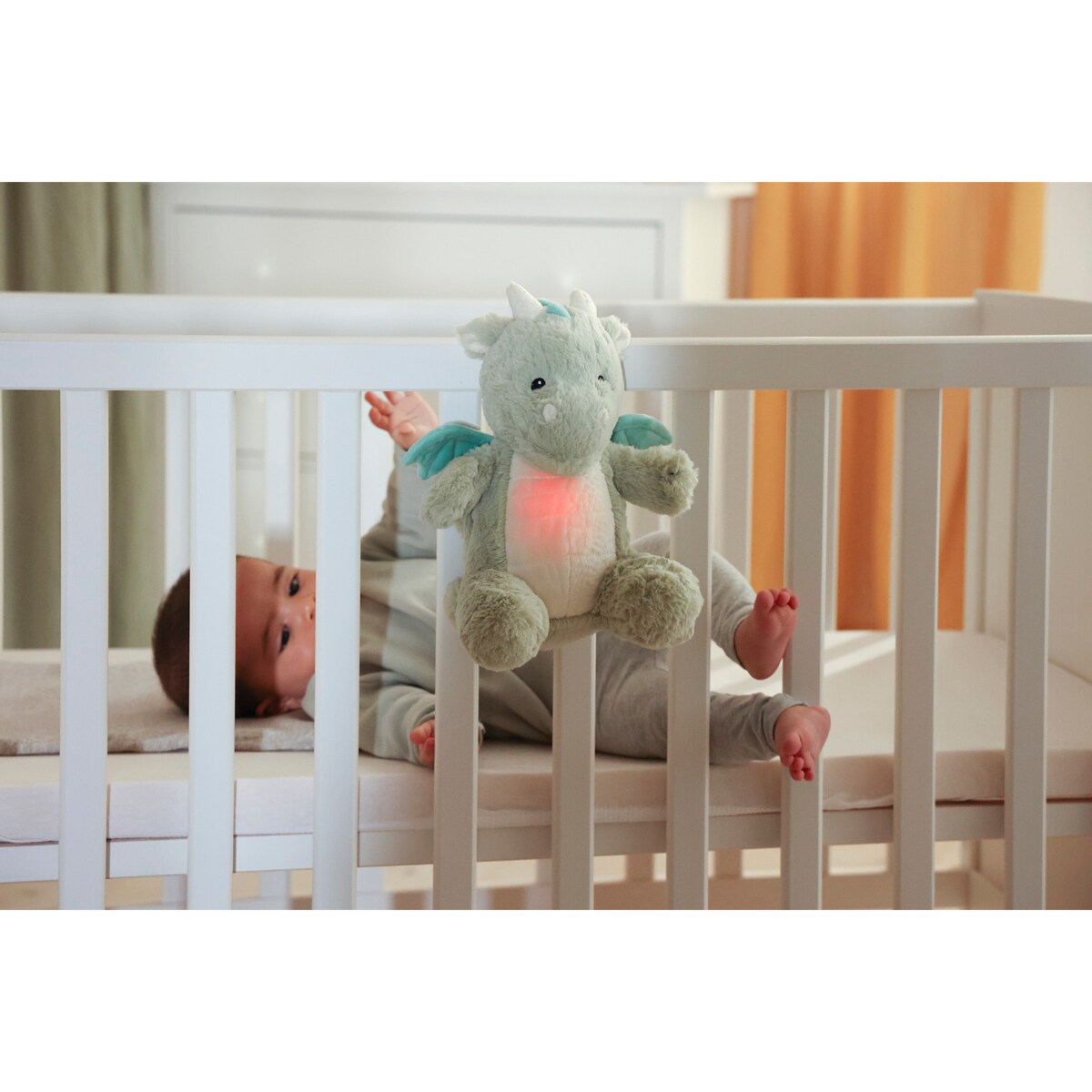 Szumiący smok z czujnikiem ruchu i pozytywką - Cloud b® LoveLight Buddies Drake the Dragon™