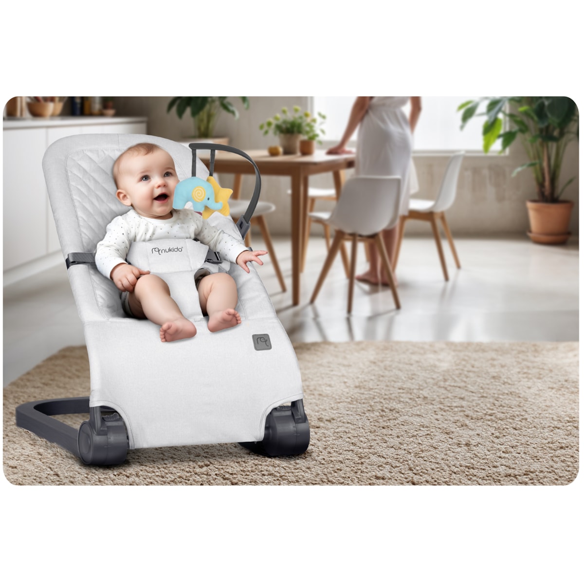 Leżaczek bujany z zabawkami składany bujaczek kołyska Nukido