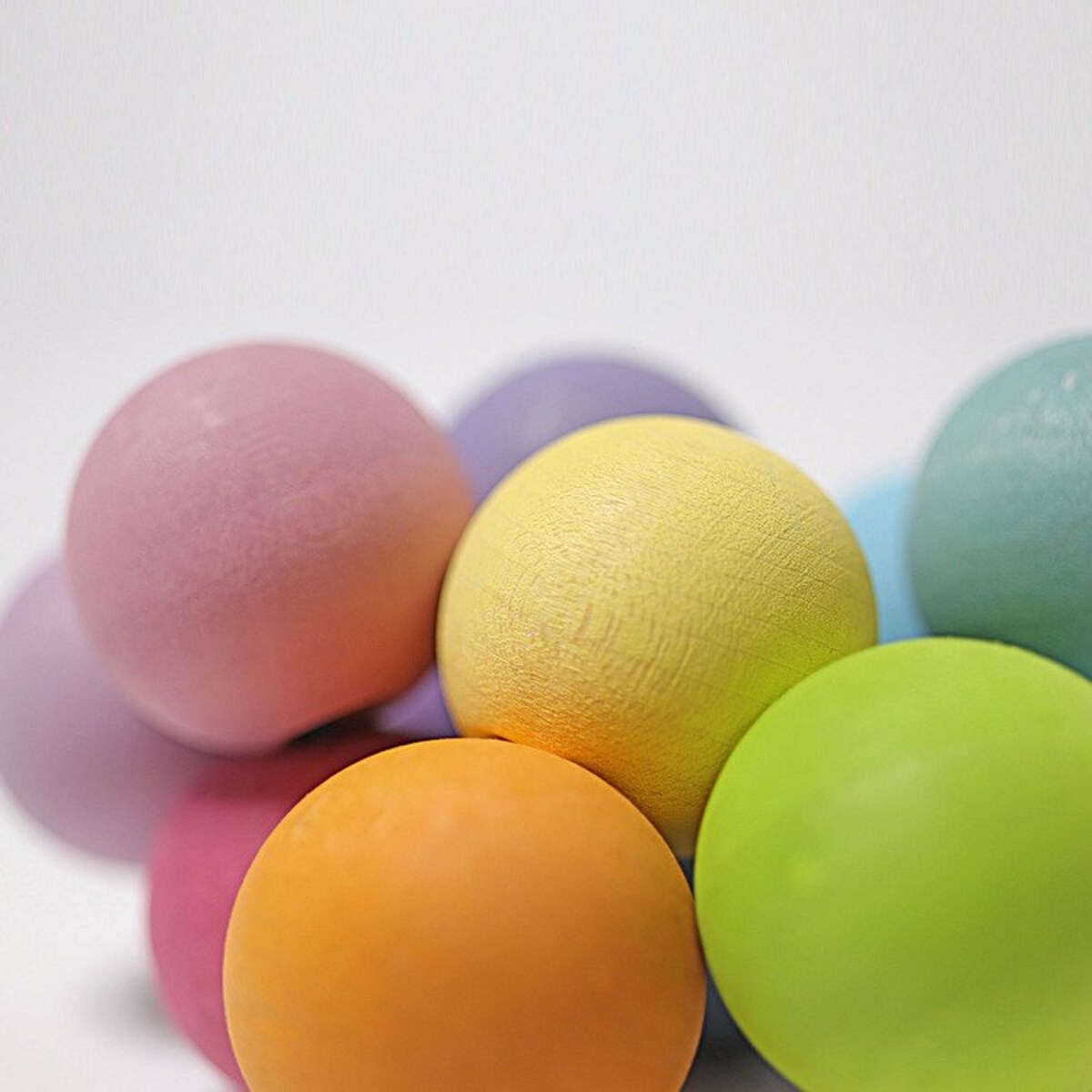 Perełki do chwytania dla niemowlaka drewniane pastelowe 0+ Grimm's