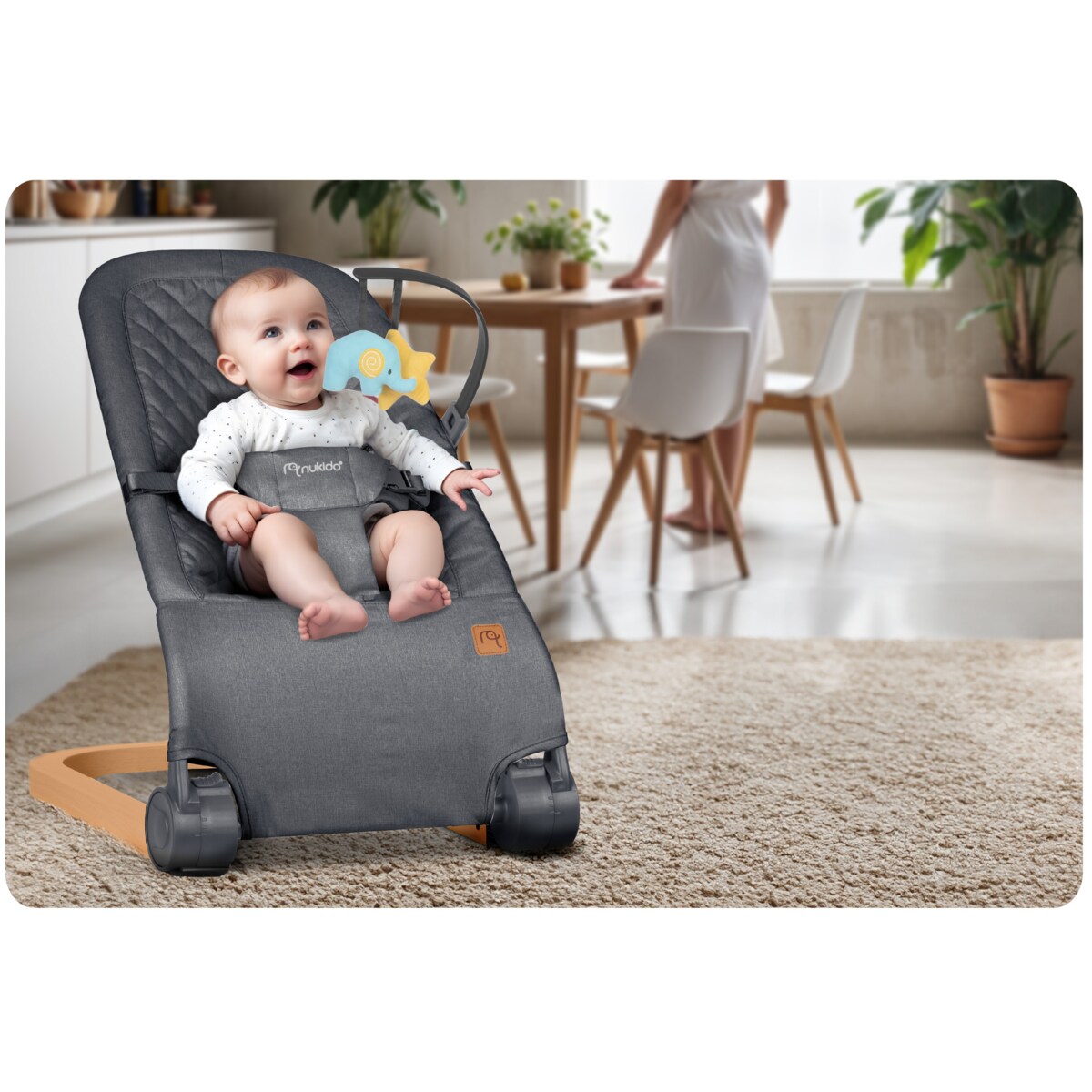 Leżaczek bujany z zabawkami składany bujaczek kołyska Nukido