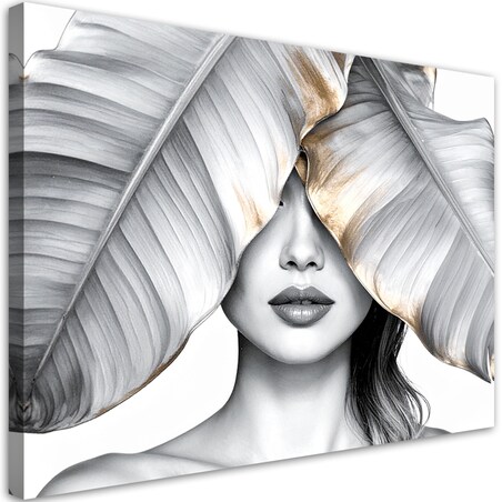 Obraz do salonu sypialni, Kobieta i srebrno złote liście bananowca 60x40